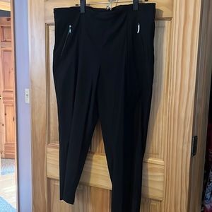 Black dressy ankle pant with zippered pockets